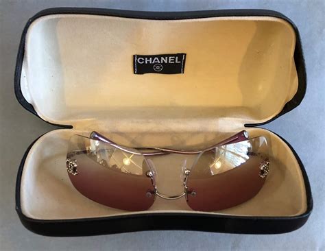 chanel vintage rimless cc sunglasses.